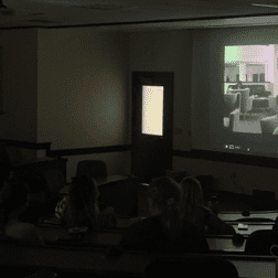 Recent W&校友罗莎·梅瑟史密斯在教室里用放映机首映了第一部电影.